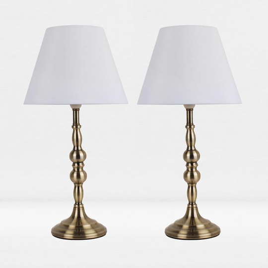 First Choice Lighting - Set of 2 Antique Brass Plated Bedside Table Light with Detailed Column and White Fabric Shade - Antique brass plate and