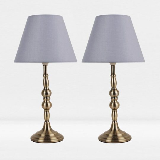 First Choice Lighting - Set of 2 Antique Brass Plated Bedside Table Light with Candle Column Grey Fabric Shade - Antique brass plate and textured