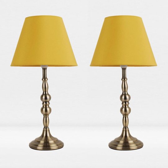 First Choice Lighting - Set of 2 Antique Brass Plated Bedside Table Light with Candle Column Ochre Fabric Shade - Antique brass plate and textured